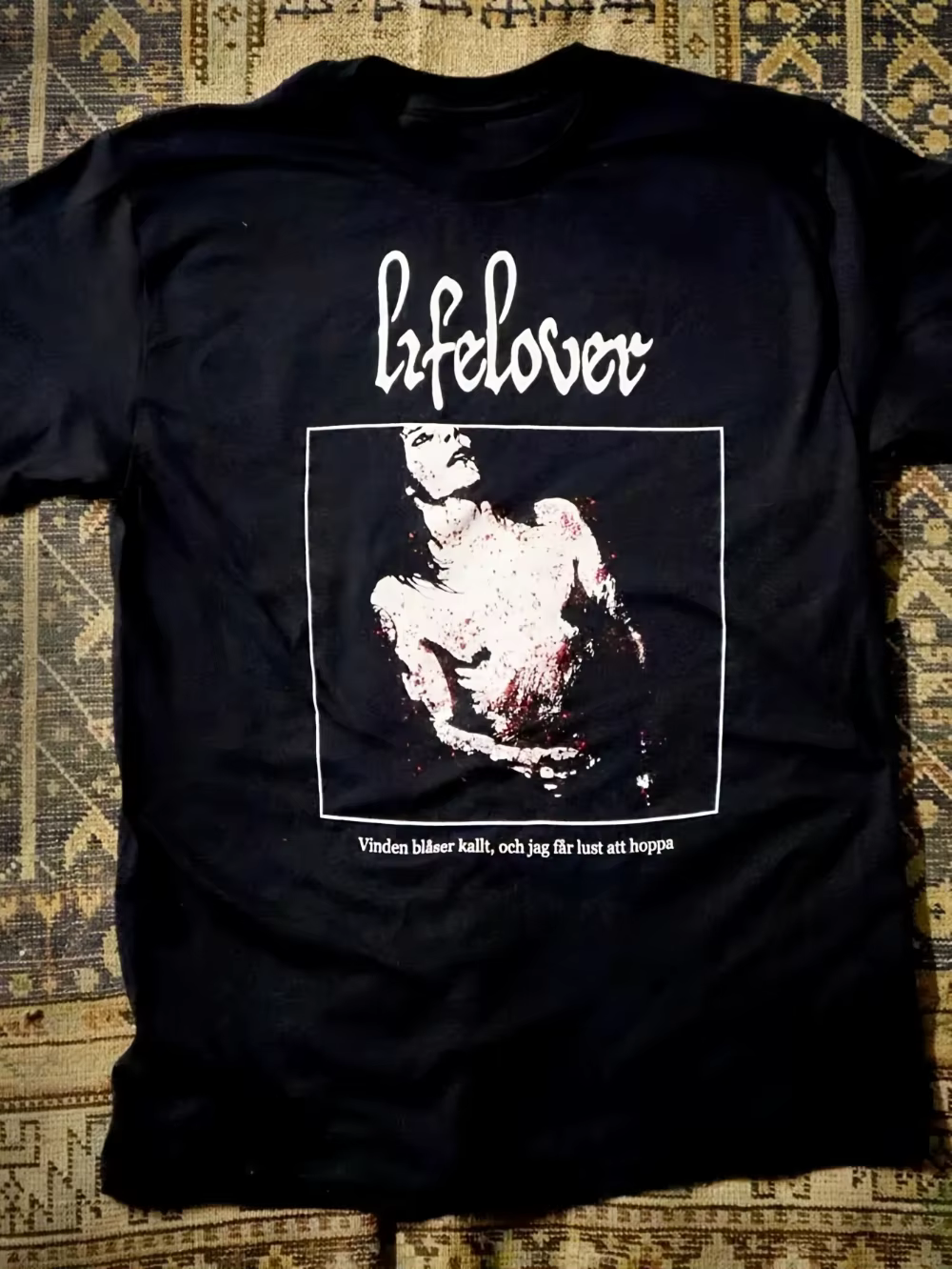 T-shirt unisexe Lifelover avec logo du groupe et paroles de chanson, noir avec impression blanche au