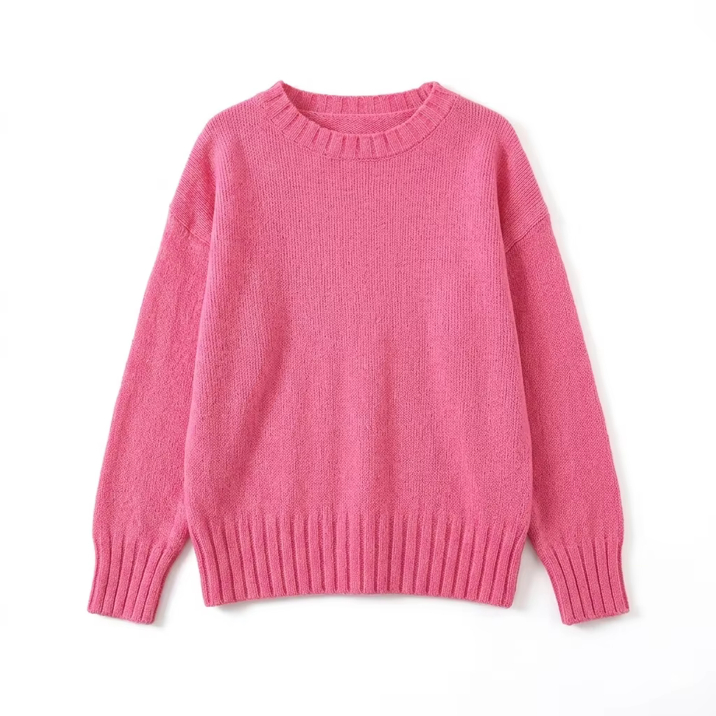 Un haut en tricot élégant, ample, léger et à col rond, de couleur rose pâle, parfait pour le printem