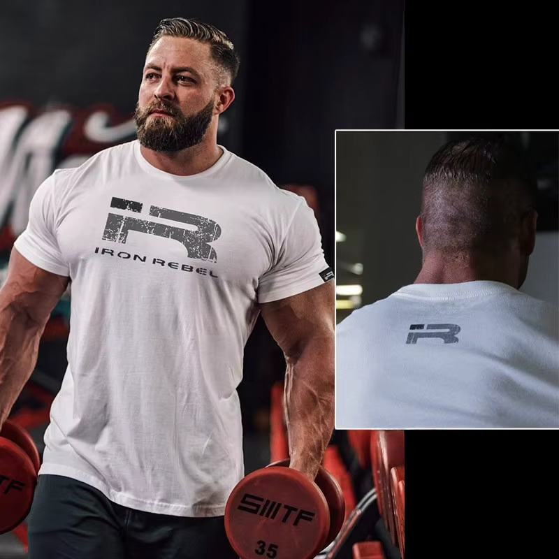 T-shirt de sport pour homme à manches courtes, coupe ajustée, avec resserrement aux poignets et épau