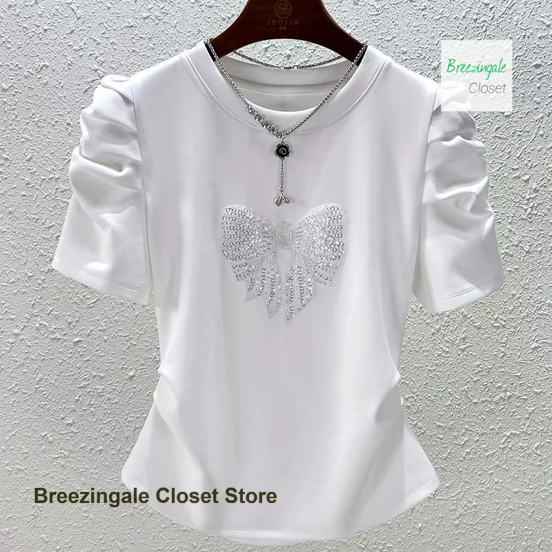 T-shirt à manches bulles avec nœud à la mode française pour femmes, nouveau design de tempérament d'