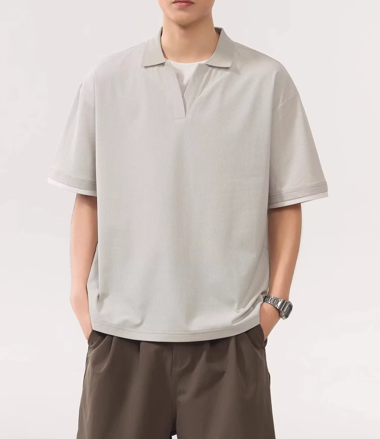 Polo homme 2026 à faux double col, coupe ample, décontracté et frais pour l'été, à manches courtes