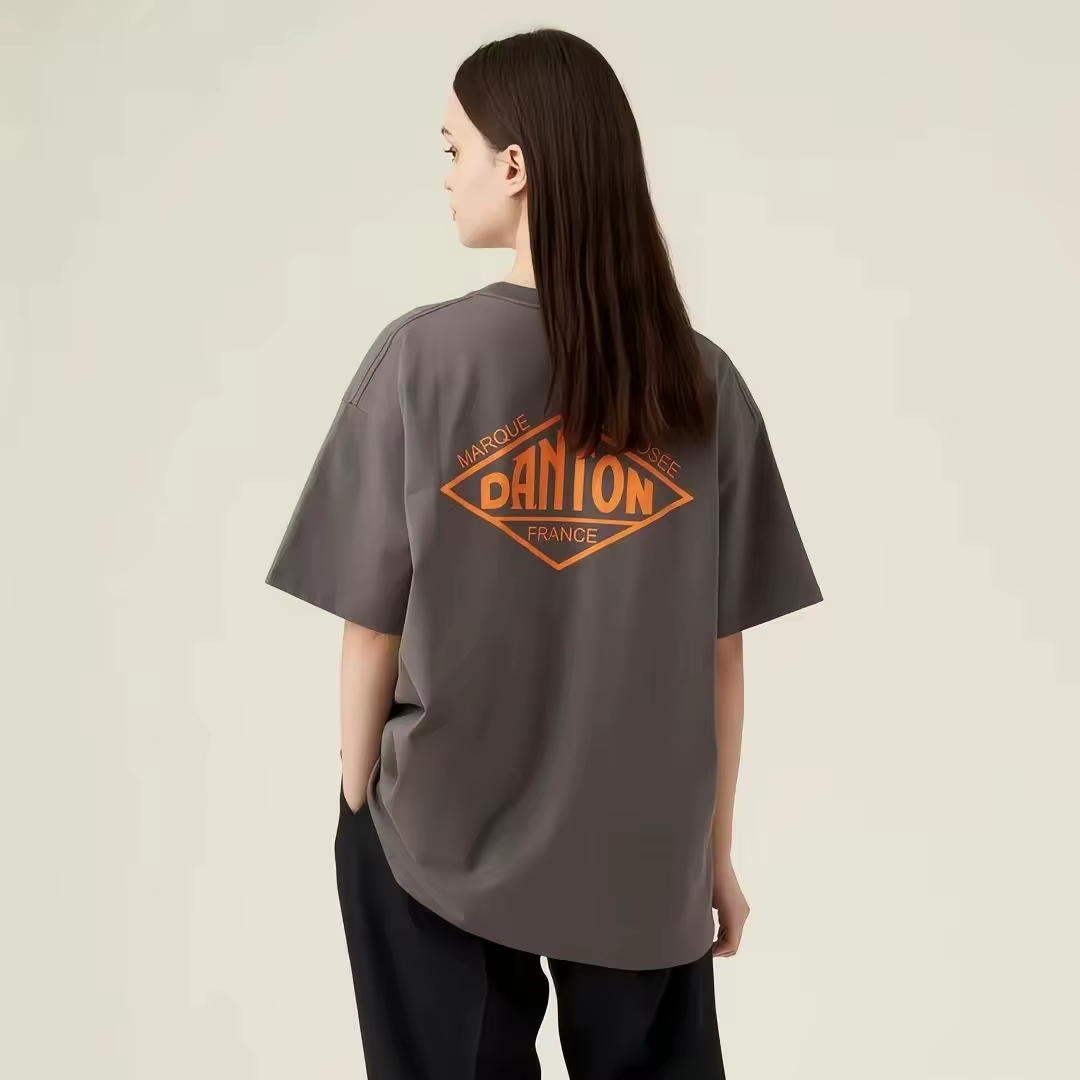 T-shirt gris à manches courtes coupe ample avec logo France imprimé et motif orange pour un style dé