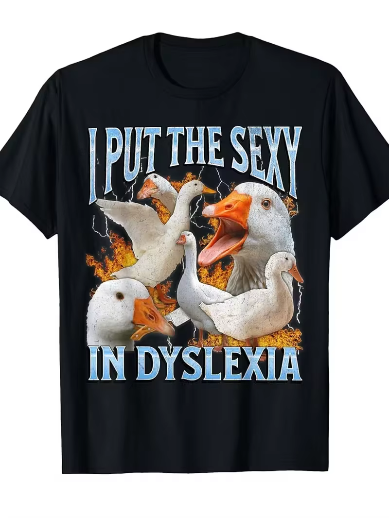 T-shirt Oversize Unisexe avec Impression Graphique Meme Canard Amusant 'I Put The Sexy in Dyslexia',