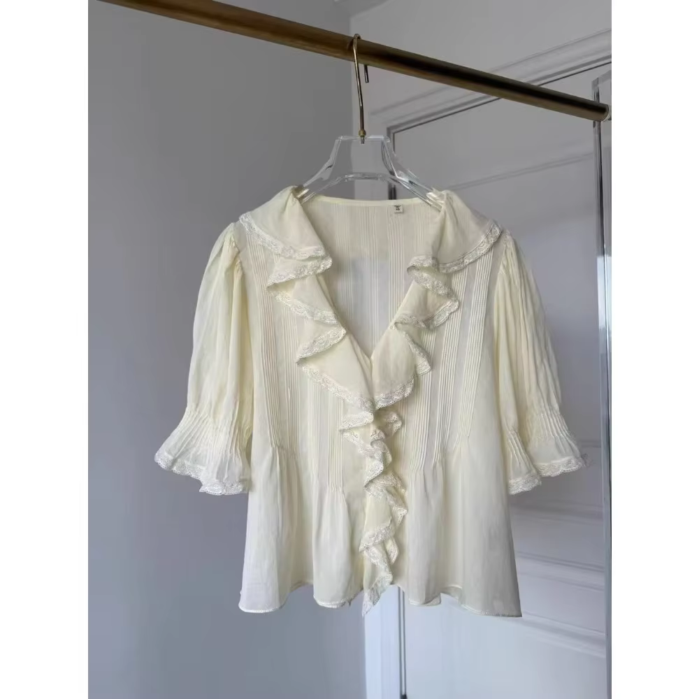Chemise à manches courtes plissée jaune en dentelle à col en V style vacances à la plage française p