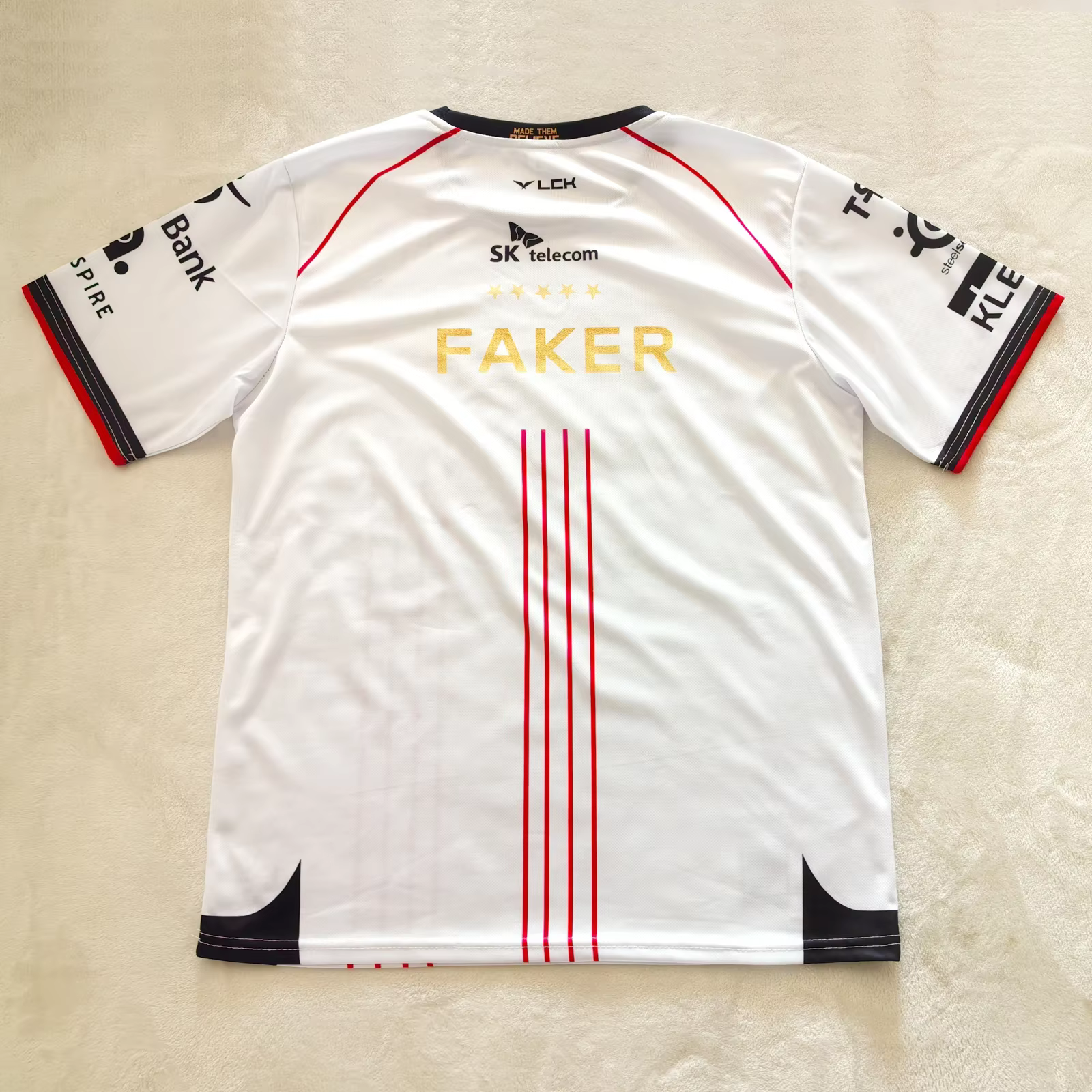 Maillot de l'équipe commémorative cinq étoiles du Championnat T1 2026 – Maillot des Finales Mondiale