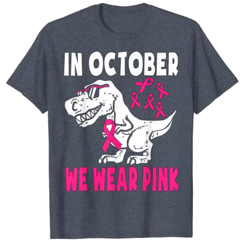 En octobre, nous portons un T-Shirt dinosaure rose pour enfants en bas âge
