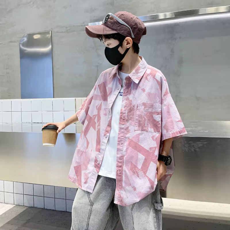Chemise d'été élégante de couleur rose pour enfants