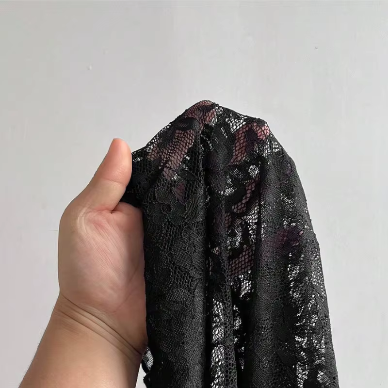 Haut à manches longues en dentelle transparente à motif floral rose