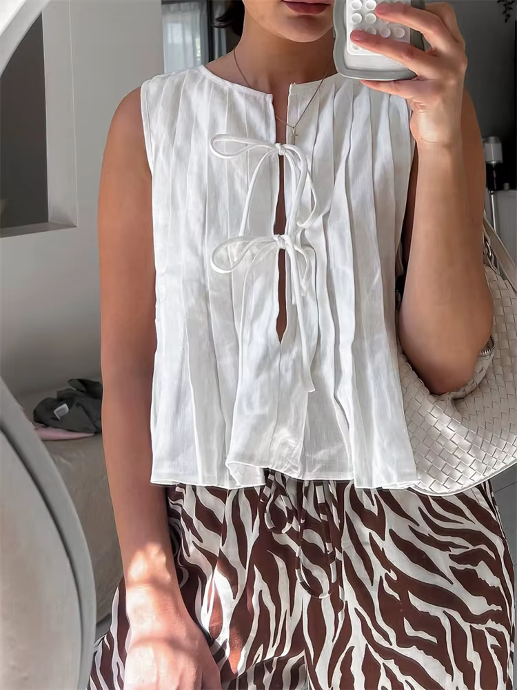 Tossy blanc pansement côtelé débardeur chemises pour femmes évider sans manches mince été mode gilet