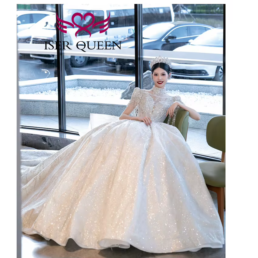 Robe de mariée de luxe personnalisée, nouvelle tendance 2026, pour femme, col montant, manches à franges, perles lourdes, robes de mariée scintillantes WX0474