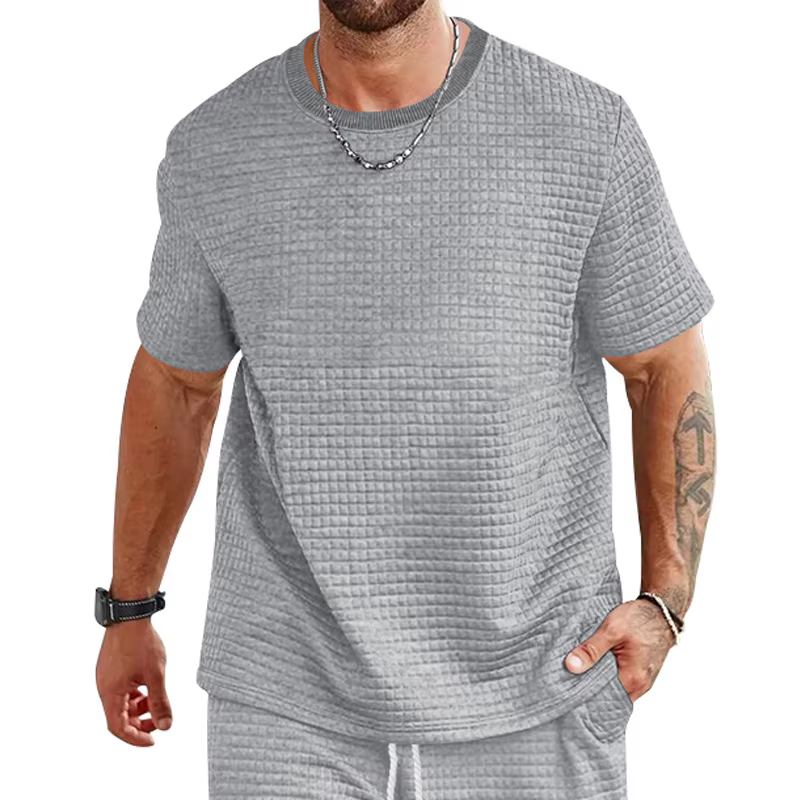 Nouveau T-shirt à manches courtes uni à col rond et petits carreaux pour homme