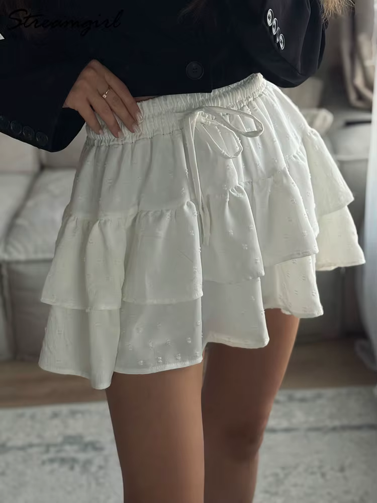 Streamgirl femmes Mini jupes avec Short sous les vêtements d'été cravate une ligne courte blanche plissée à volants