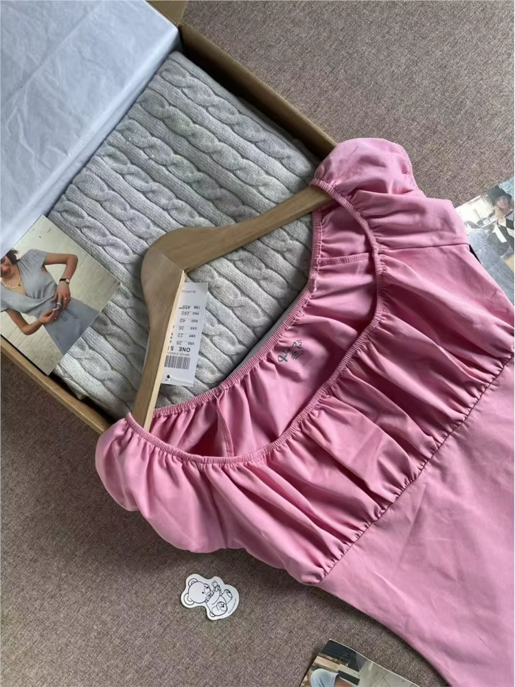 T-shirt rose en maille plissée à manches courtes pour femme