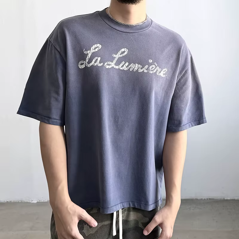 T-shirt décontracté unisexe Saint La Lumière avec logo imprimé lettres craquelées