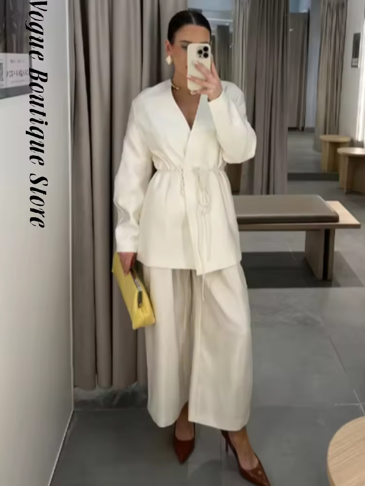 Ensemble élégant pour femme : veste ample unie à lacets et manches longues col en V