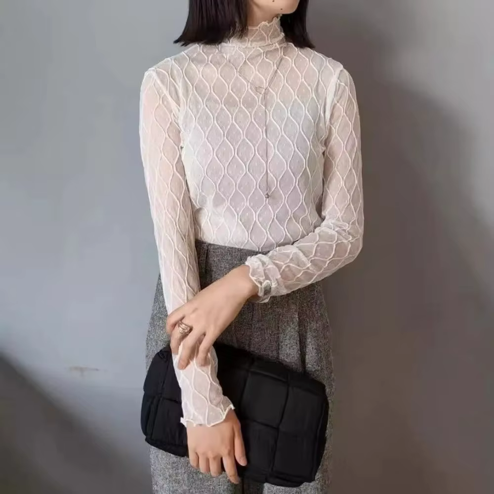 Haut à col roulé sexy et élégant en maille unie