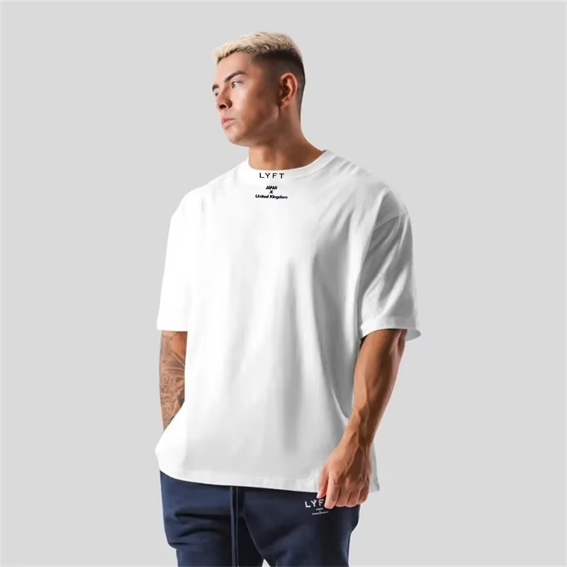 T-shirt en coton pour homme, coupe ample, manches courtes, adapté au sport, à la remise en forme, à la course à pied et aux entraînements