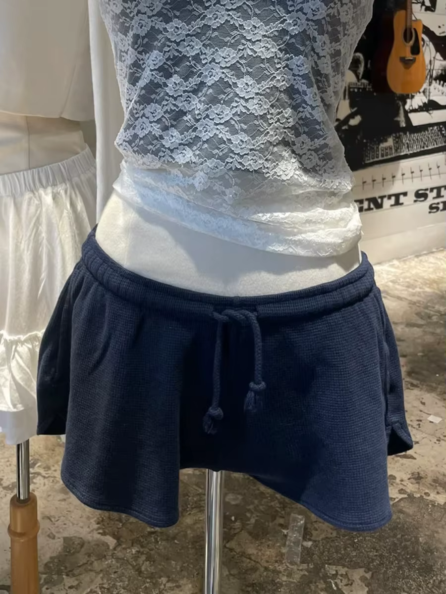 Shorts de sport gaufrés bleu marine pour femme