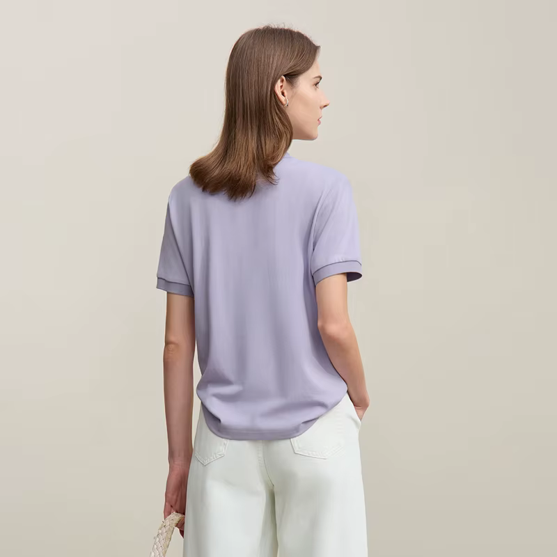 Polo Amii pour femme – Collection été 2026 – T-shirt décontracté à col revers et manches courtes avec patte de boutonnage asymétrique – Idéal pour superposer – Référence 12622015