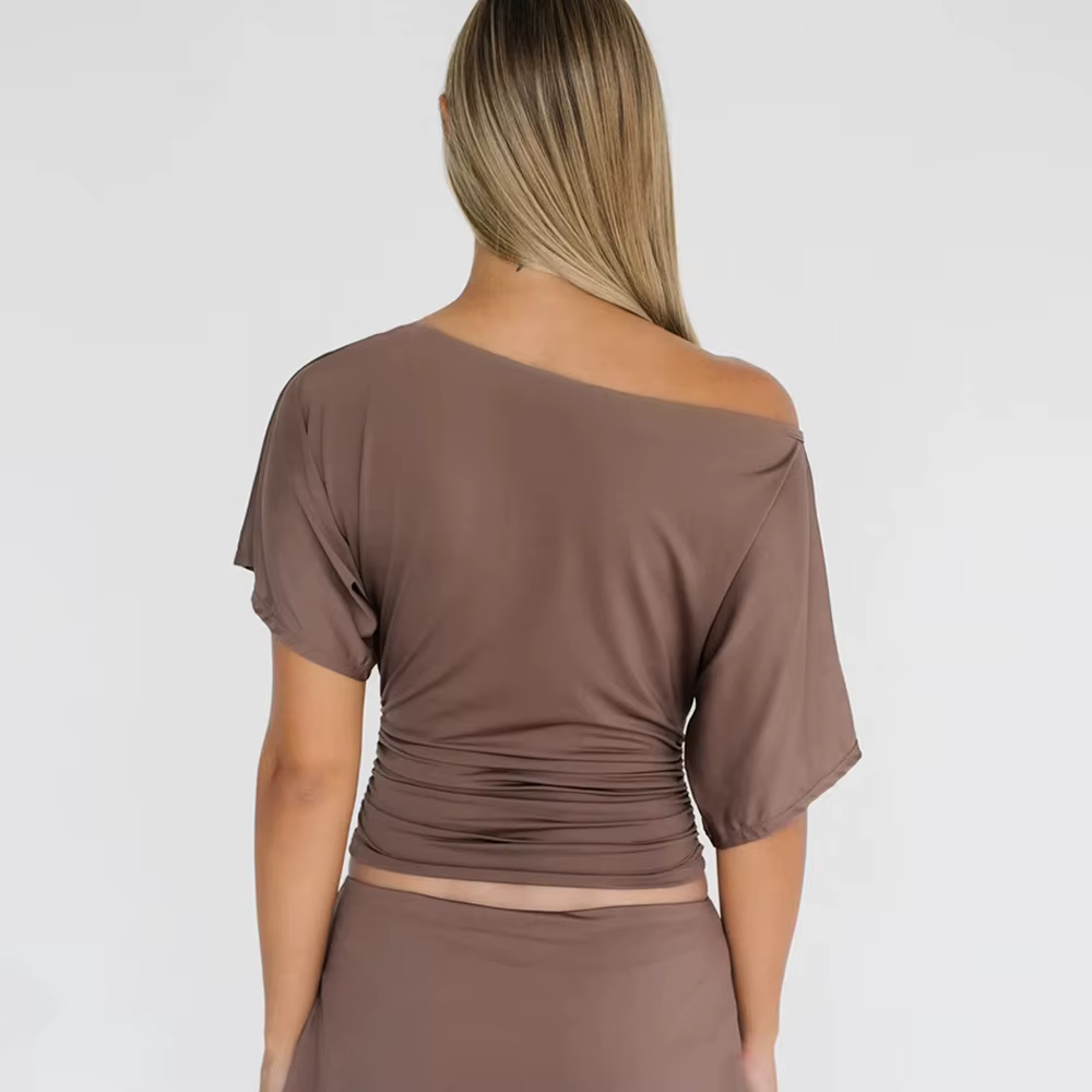 Haute qualité vente chaude en gros été nouveau T-shirt femme Sexy épicé fille plissée simple épaule col incliné haut ajusté