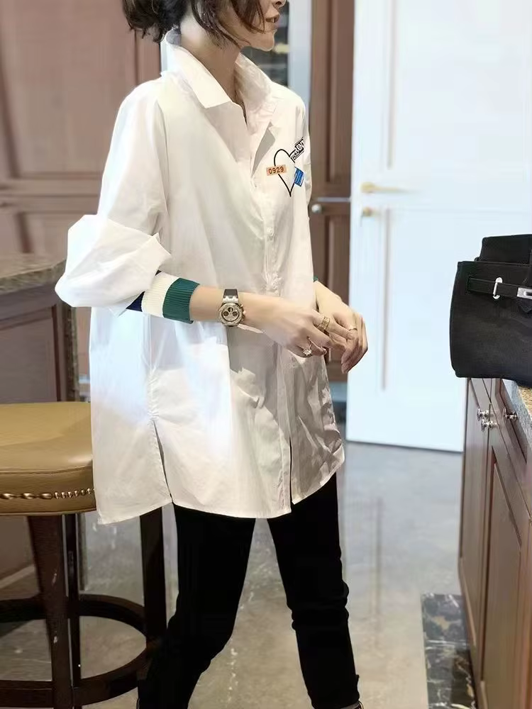 Chemisier blanc ample à manches longues pour femme