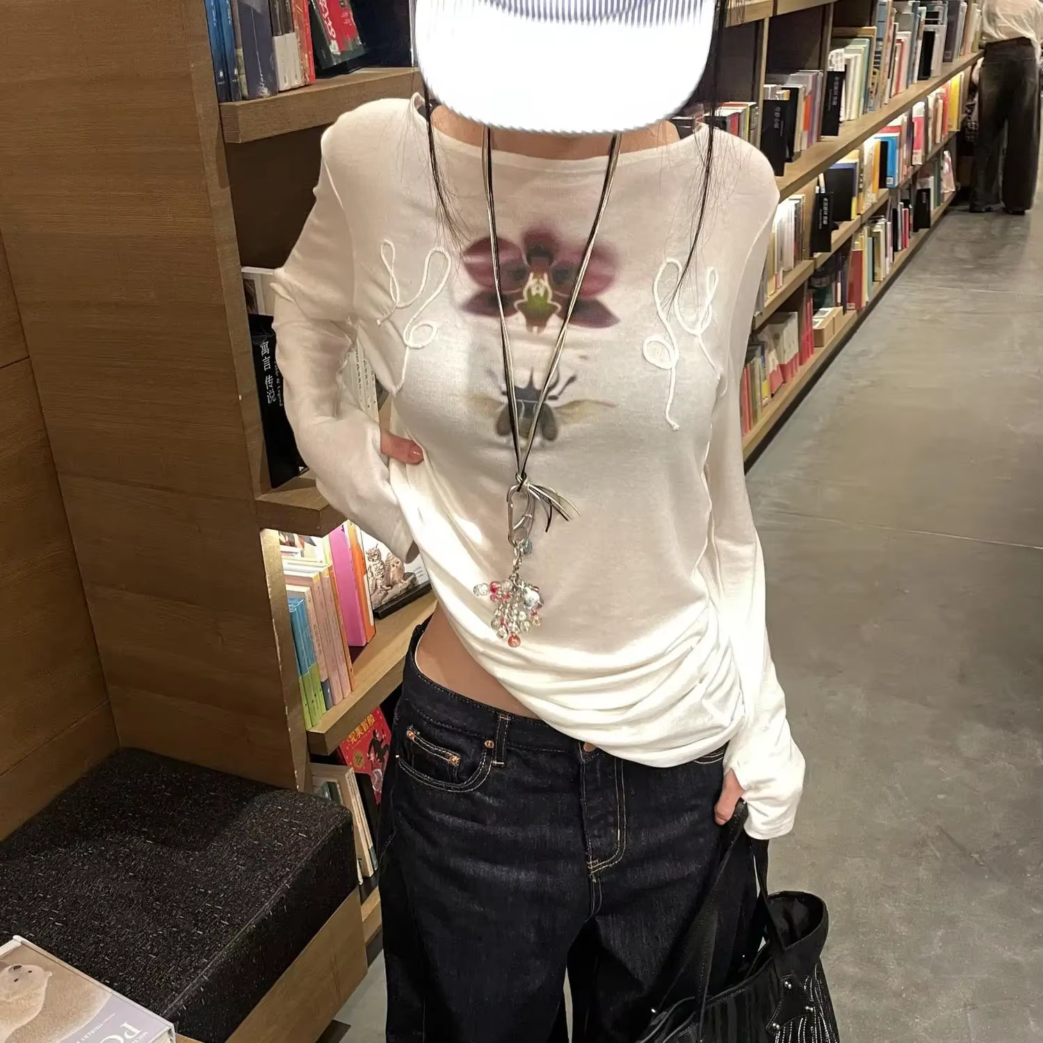 T-shirt Onalippa tendance imprimé style décontracté épaules dénudées légèrement transparent col rond manches longues haut de base 2026 Nouveauté