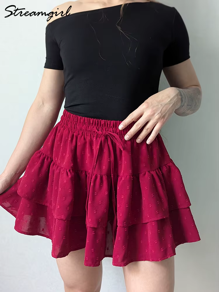 Streamgirl femmes Mini jupes avec Short sous les vêtements d'été cravate une ligne courte blanche plissée à volants