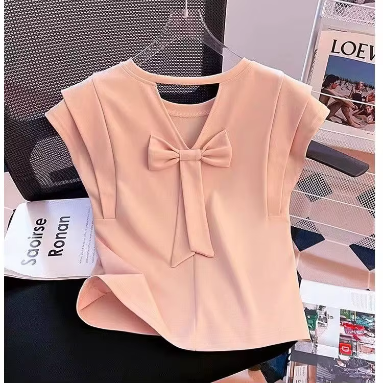 T-shirt français à manches bouffantes pour femmes, nouveau dos ajouré, chic, beau petit haut, été 2025