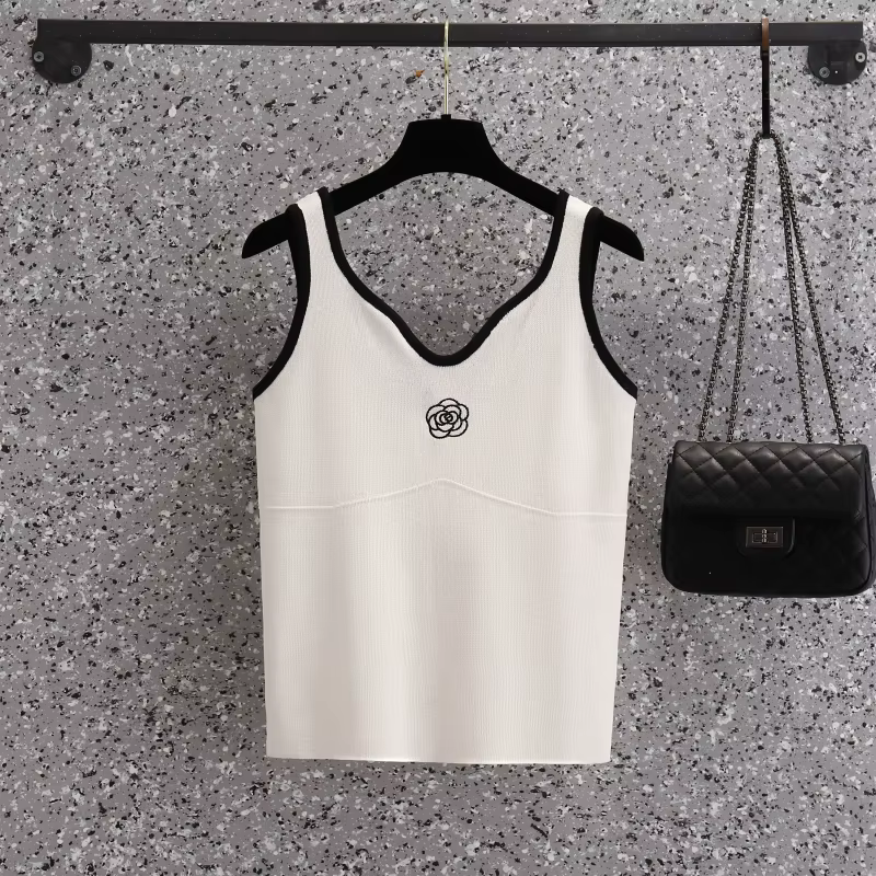 T-shirt sans manches à fleurs blanches pour femmes