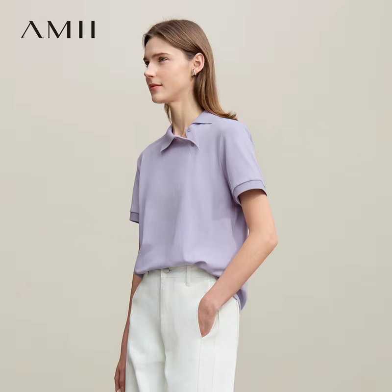 Polo Amii pour femme – Collection été 2026 – T-shirt décontracté à col revers et manches courtes avec patte de boutonnage asymétrique – Idéal pour superposer – Référence 12622015