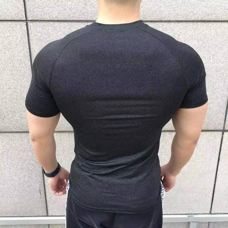 Nouveaux hommes d'été à manches courtes Fitness t-shirt course Sport Gym couleur unie séchage rapide
