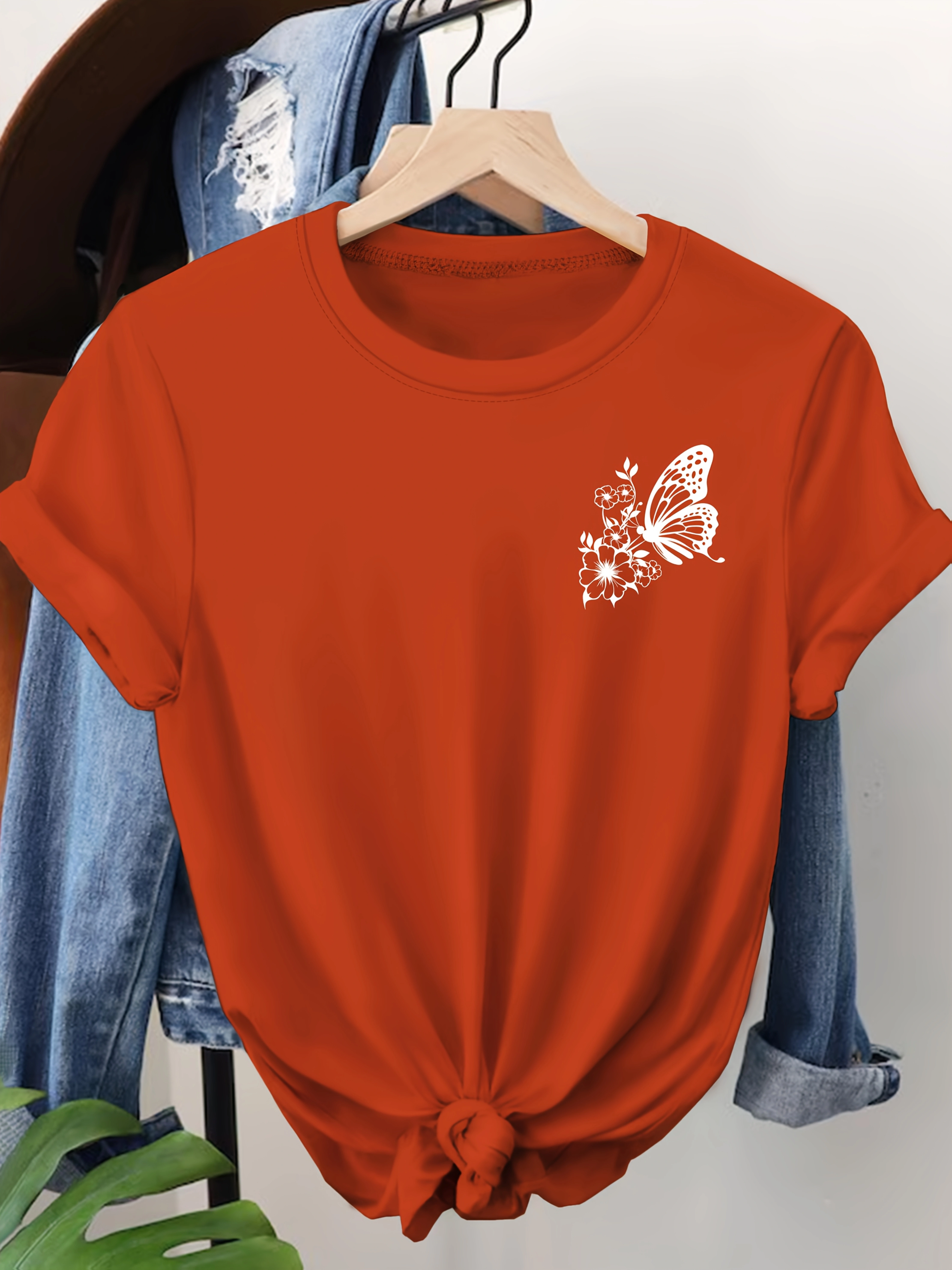 Orange vif avec papillon blanc imprimé T-shirt fille dessin animé unisexe hauts à manches courtes Streetwear femmes col rond t-shirts femme