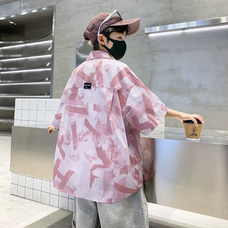 Chemise d'été élégante de couleur rose pour enfants