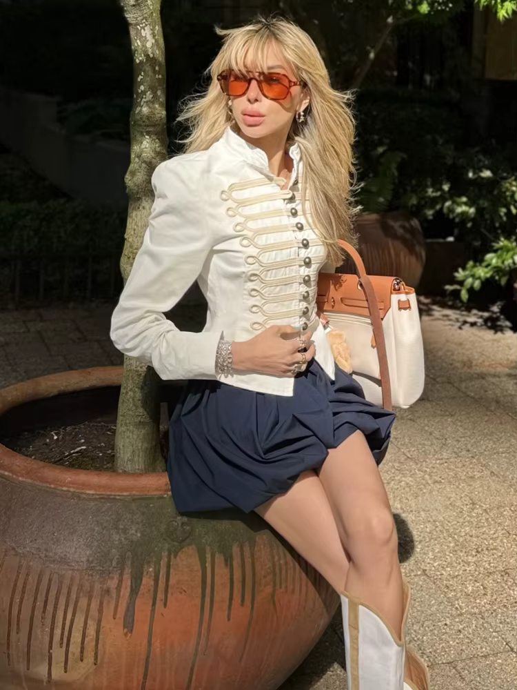 Veste élégante blanche nouée pour femme