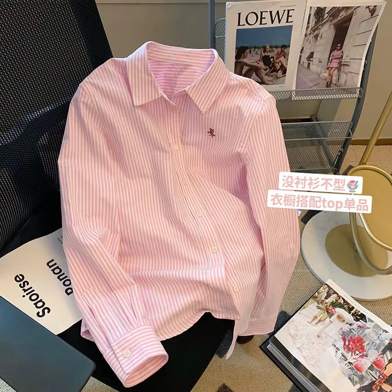 Chemise rayée à col polo pour femme