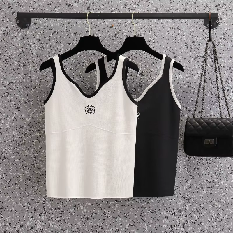 T-shirt sans manches à fleurs blanches pour femmes