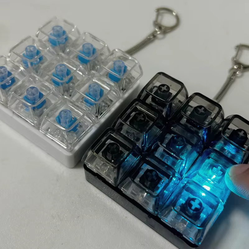 LED 9 touches Keycap porte-clés pour femmes hommes lumineux soulagement du Stress doigt pendentifs Fidget clavier sac à