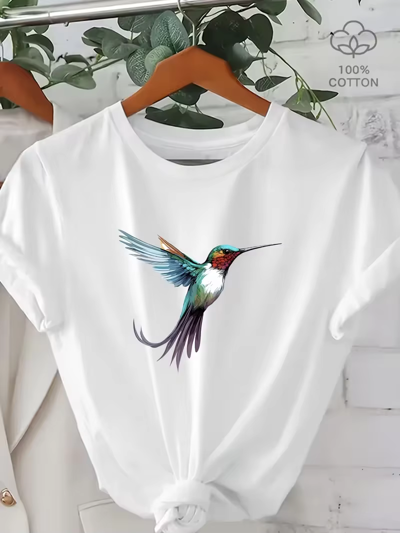 T-shirt unisexe décontracté en coton à col rond et manches courtes avec imprimé colibris aquarelle et accents floraux pour les amateurs d'oiseaux