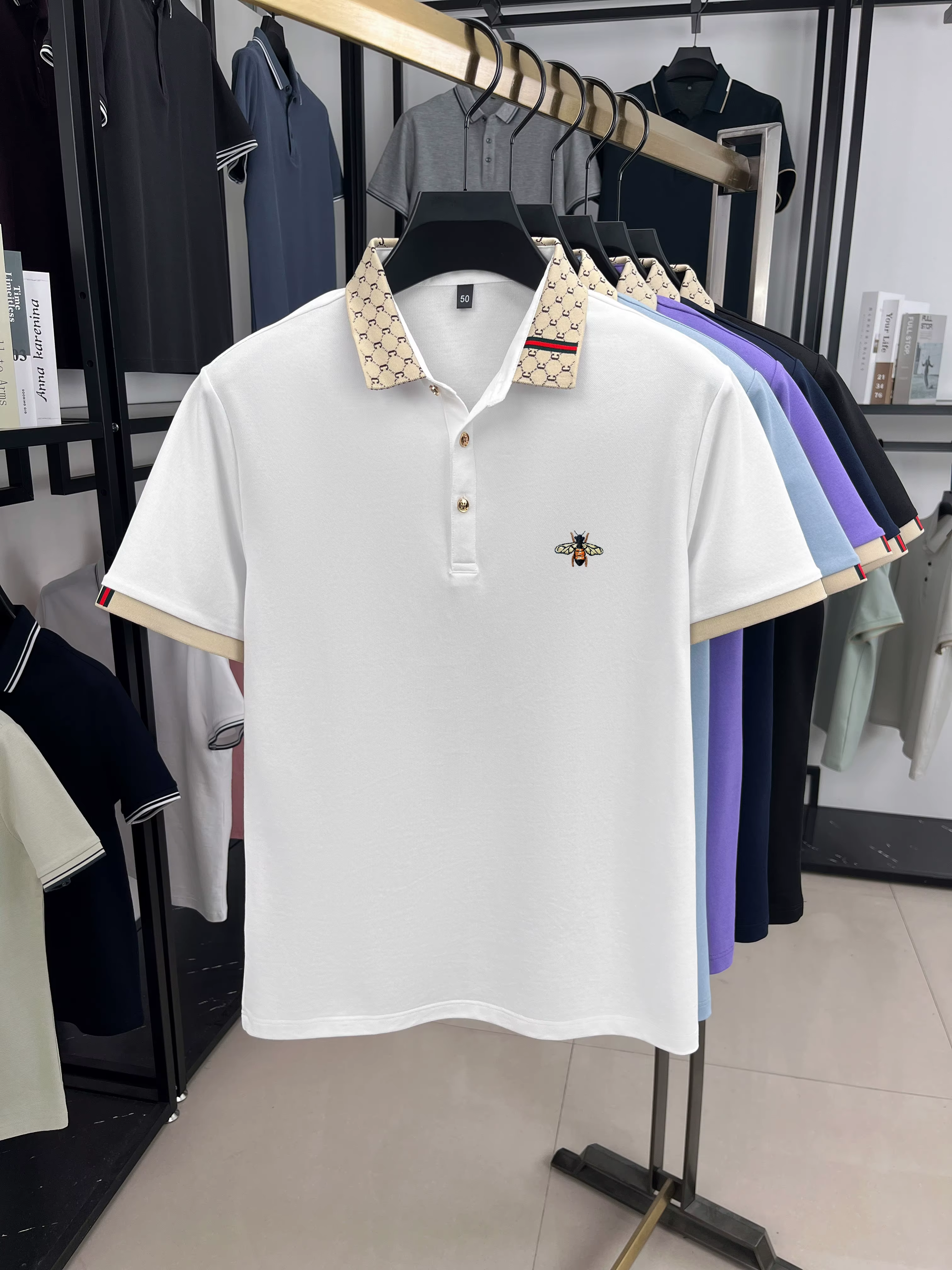 Polo à manches courtes de marque de luxe légère T-shirt à revers bloqué de couleur brodée d'abeille vêtements décontractés pour hommes nouvelle collection été