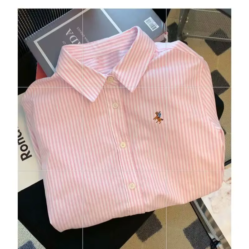 Chemise rayée à col polo pour femme