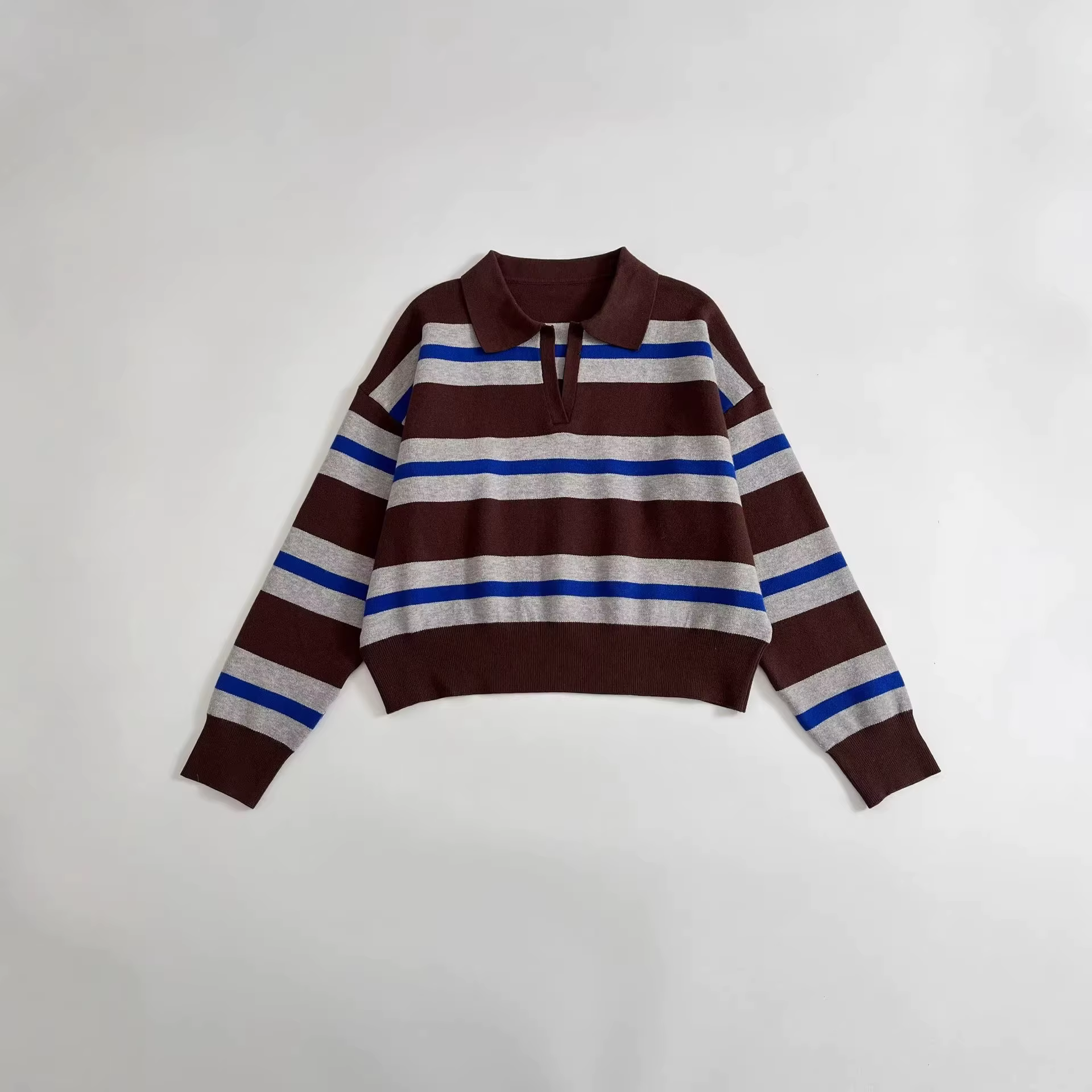 Polo à manches longues en tricot rayé pour femme