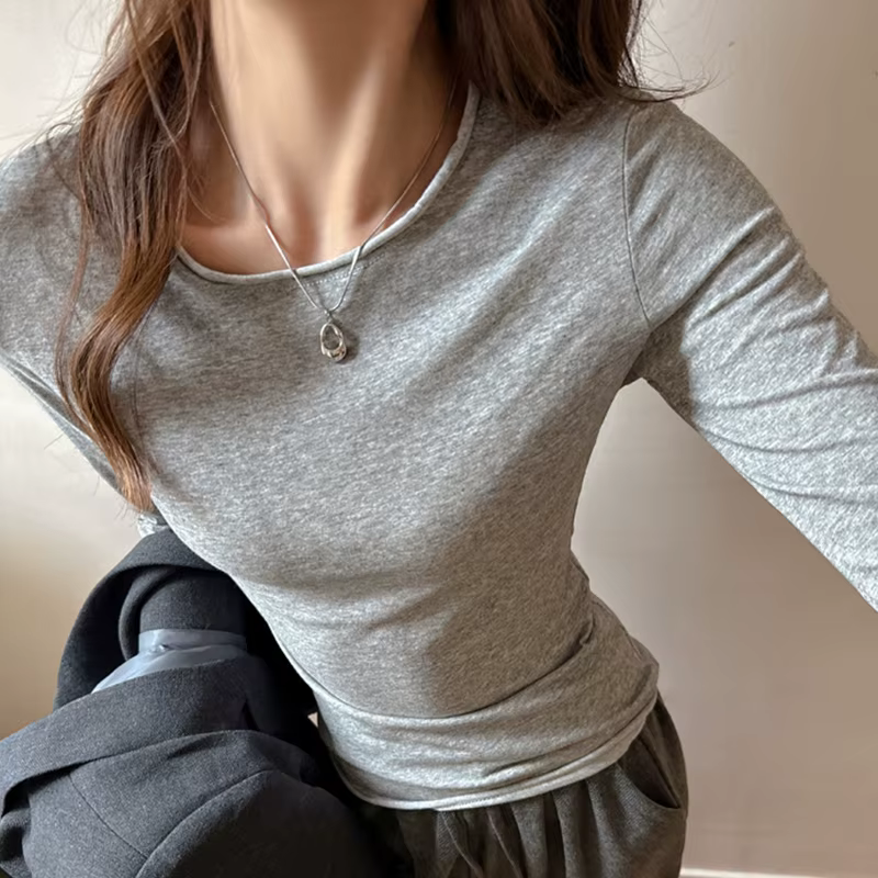 T-shirt gris à col rond et manches longues pour femme