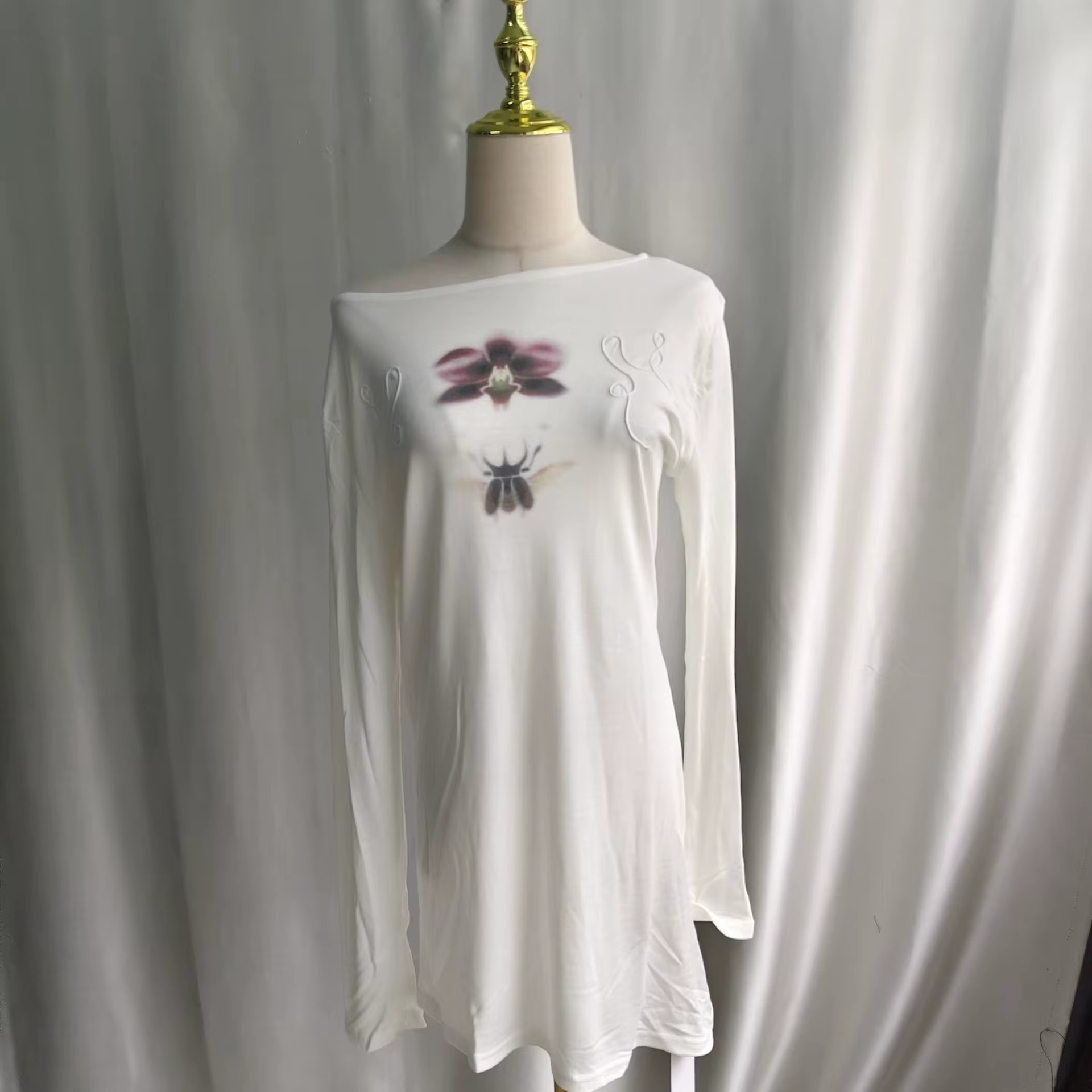 T-shirt Onalippa tendance imprimé style décontracté épaules dénudées légèrement transparent col rond manches longues haut de base 2026 Nouveauté
