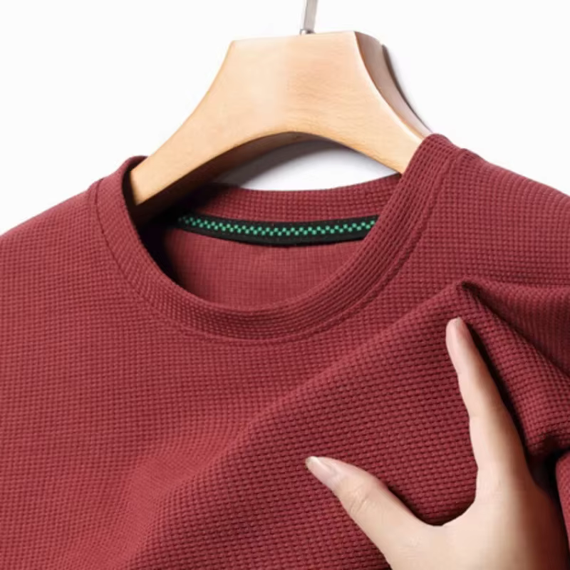 Polo à manches courtes en tissu gaufré uni