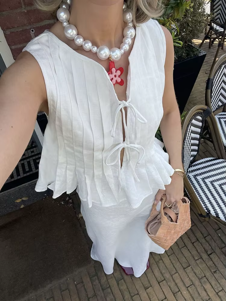 Tossy blanc pansement côtelé débardeur chemises pour femmes évider sans manches mince été mode gilet