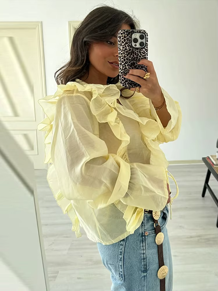 Chemises pour femmes Chic à volants creux à lacets en mousseline de soie col en v manches évasées Blouse femme 2025 printemps nouveau élégant solide dame vêtements d'extérieur