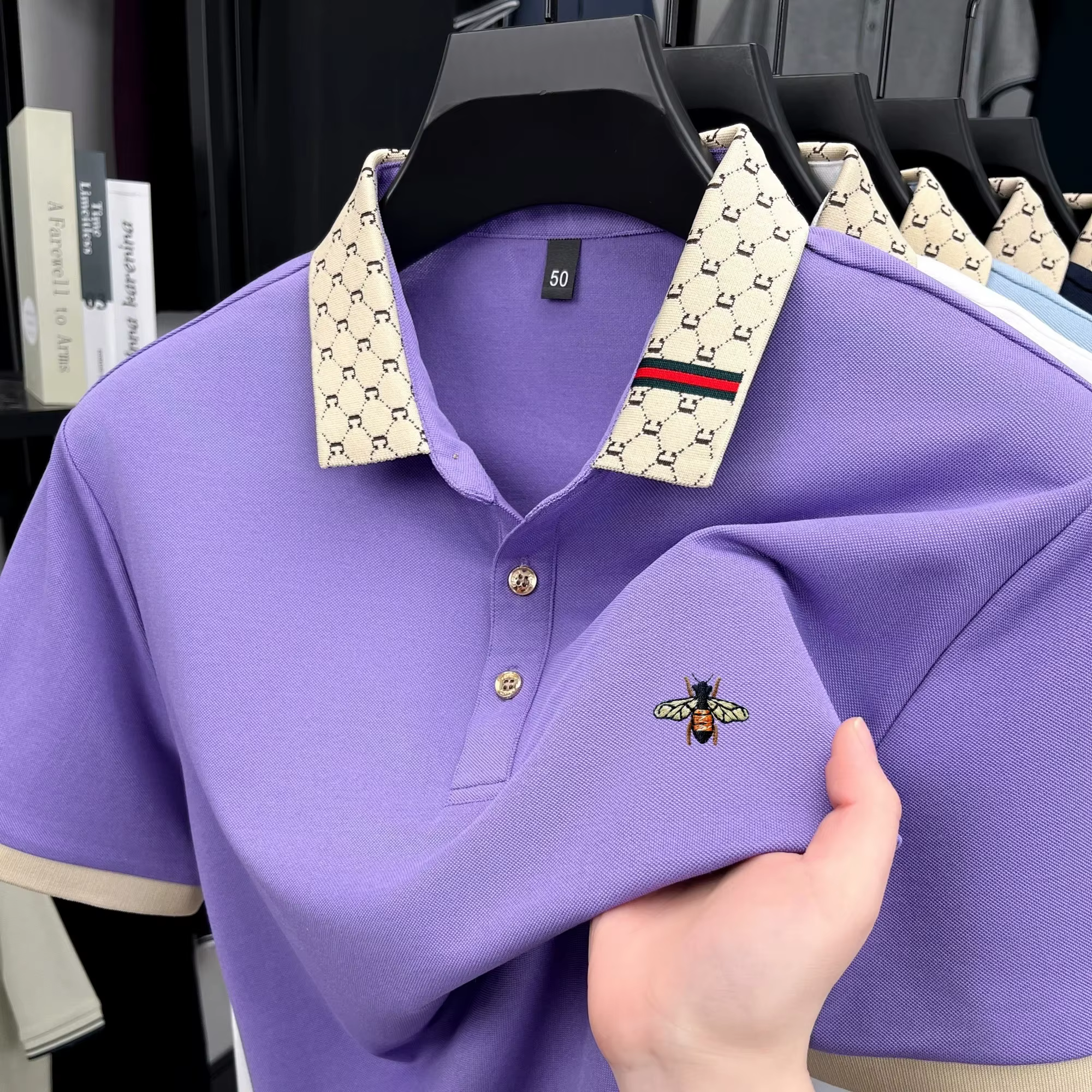 Polo à manches courtes de marque de luxe légère T-shirt à revers bloqué de couleur brodée d'abeille vêtements décontractés pour hommes nouvelle collection été