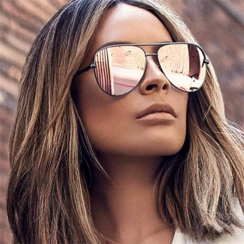 Lunettes de soleil rose pistolet