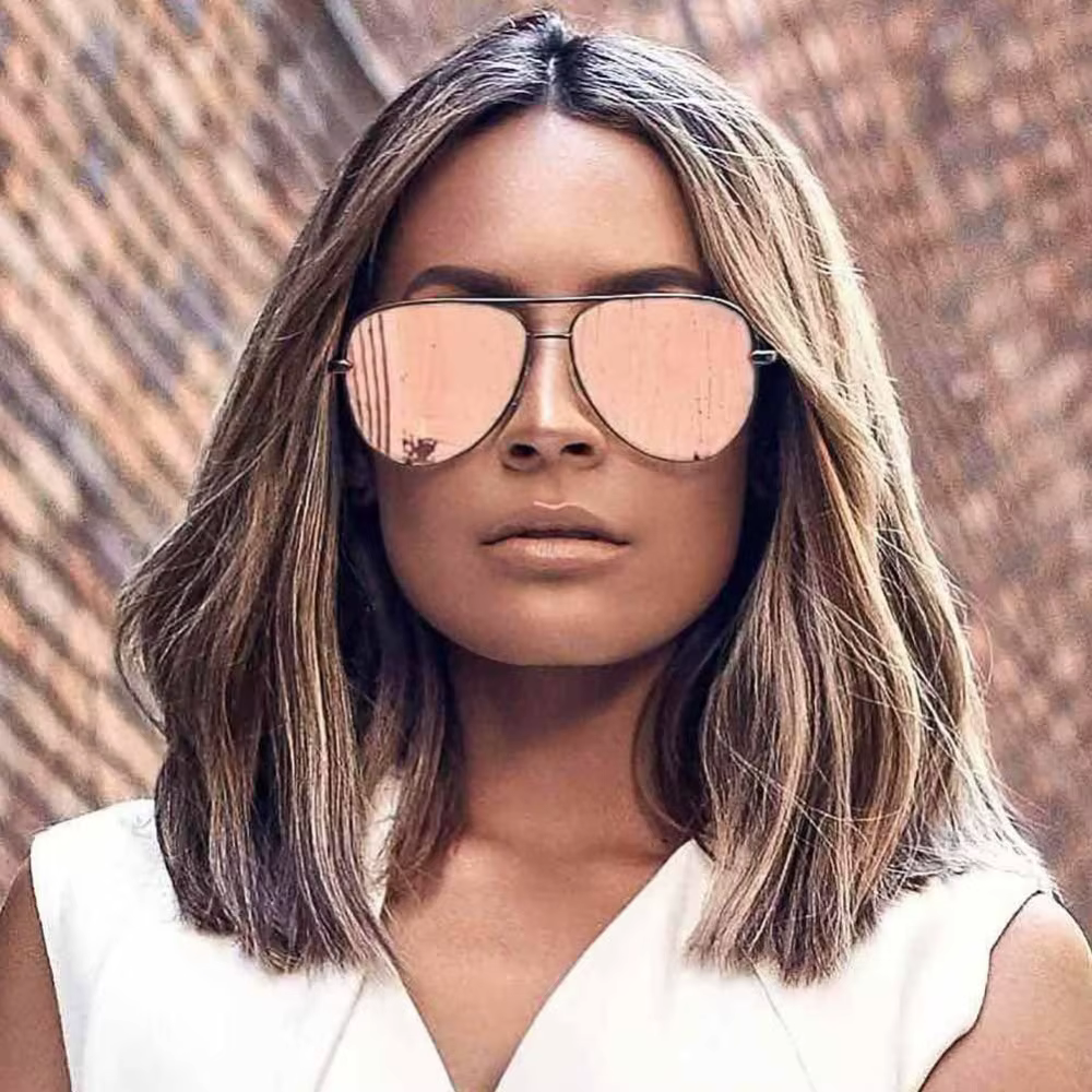 Lunettes de soleil rose pistolet