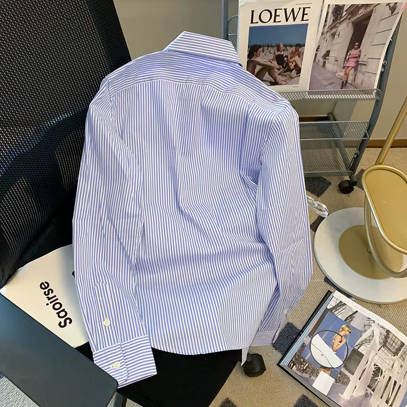 Chemise rayée à col polo pour femme